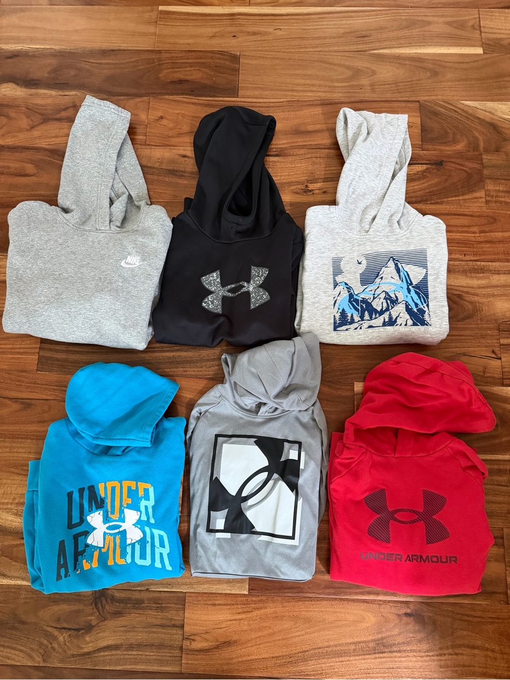 Nike and Under Armour hoodies